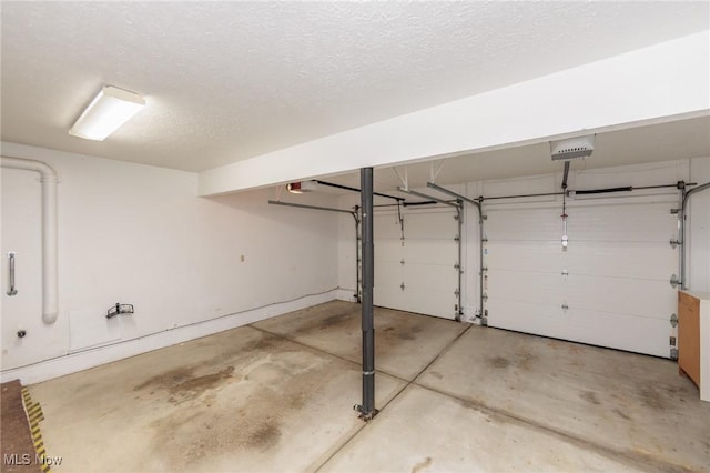 373 Chesapeake Cv, Painesville, OH 44077 - garage featuring a garage door opener