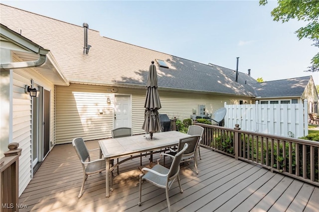 373 Chesapeake Cv, Painesville, OH 44077 - wooden terrace with outdoor dining area