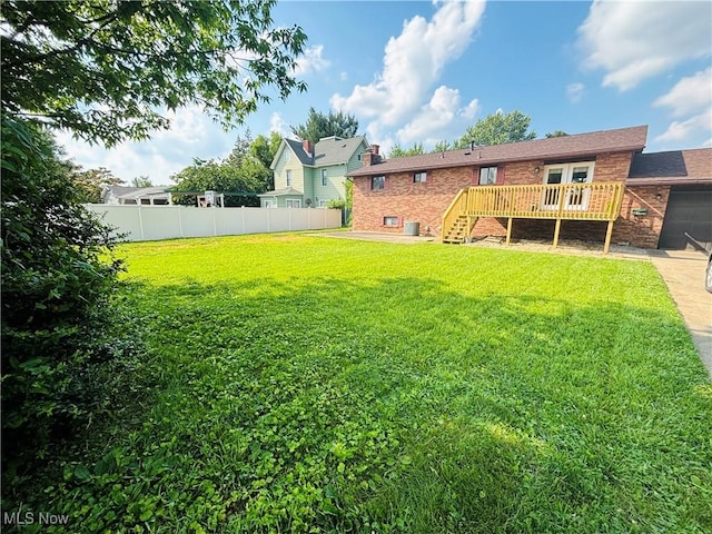 206 E 4th St, Williamstown, WV 26187 - view of yard with a wooden deck, stairs, and french doors