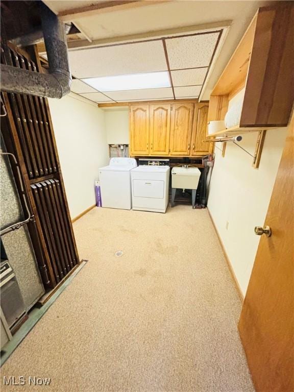 206 E 4th St, Williamstown, WV 26187 - laundry room with washing machine and dryer, cabinet space, and carpet floors