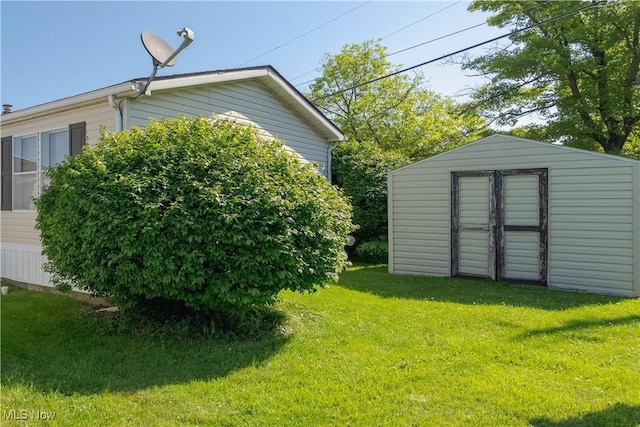 18592 Edwards Rd Unit 1, Doylestown, OH 44230 - view of green lawn featuring a shed