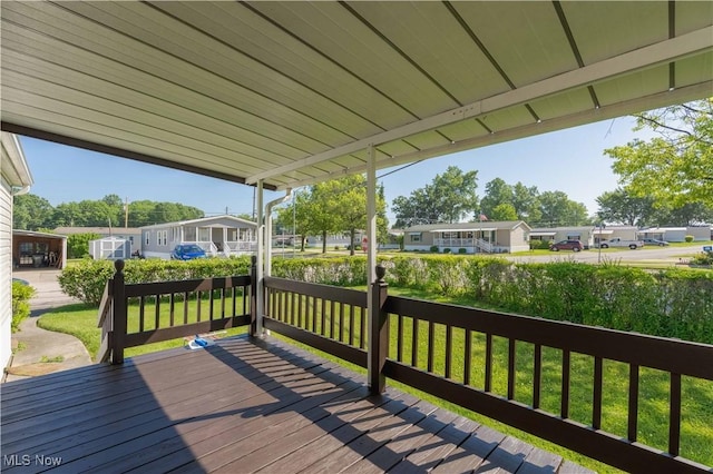 18592 Edwards Rd Unit 1, Doylestown, OH 44230 - deck with a residential view and a lawn