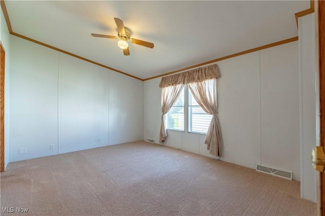 18592 Edwards Rd Unit 1, Doylestown, OH 44230 - empty room with crown molding, a ceiling fan, and carpet flooring
