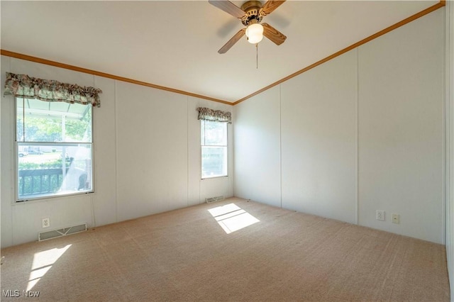 18592 Edwards Rd Unit 1, Doylestown, OH 44230 - carpeted spare room featuring vaulted ceiling, a ceiling fan, and ornamental molding