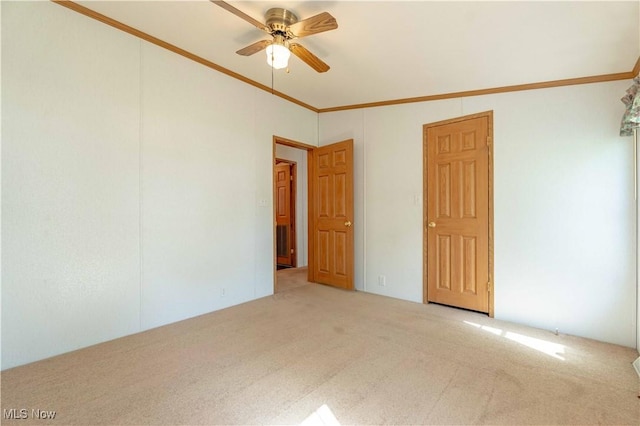 18592 Edwards Rd Unit 1, Doylestown, OH 44230 - carpeted empty room with crown molding and ceiling fan