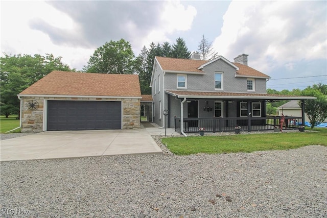 3316 S Canfield Niles Rd, Canfield, OH 44406 - view of front of property with a chimney, a front lawn, and stone siding
