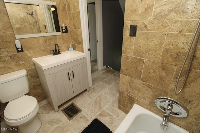 3316 S Canfield Niles Rd, Canfield, OH 44406 - bathroom featuring tile walls, vanity, and tasteful backsplash