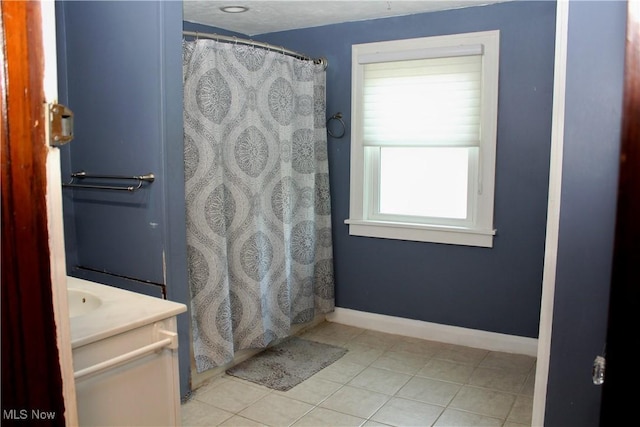 195 W 10th St, Salem, OH 44460 - full bath with vanity and tile patterned floors
