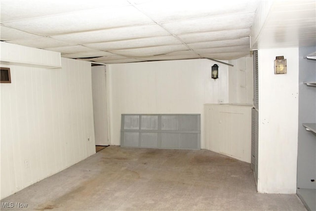 195 W 10th St, Salem, OH 44460 - basement with light colored carpet, wooden walls, and a paneled ceiling