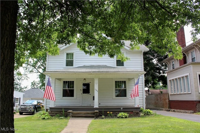 195 W 10th St, Salem, OH 44460 - traditional style home with a porch and roof with shingles