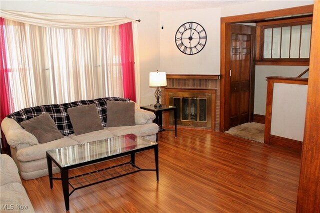 195 W 10th St, Salem, OH 44460 - living area featuring wood finished floors and a fireplace
