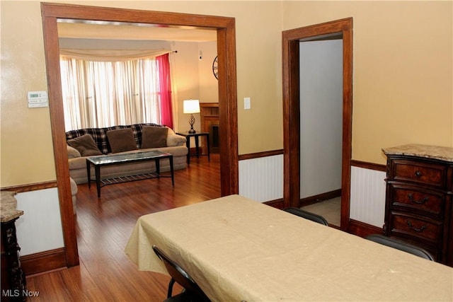 195 W 10th St, Salem, OH 44460 - bedroom with wood finished floors and wainscoting
