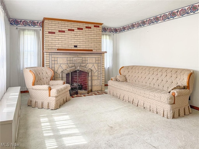 1120 N 5th St, Toronto, OH 43964 - carpeted living room with a fireplace