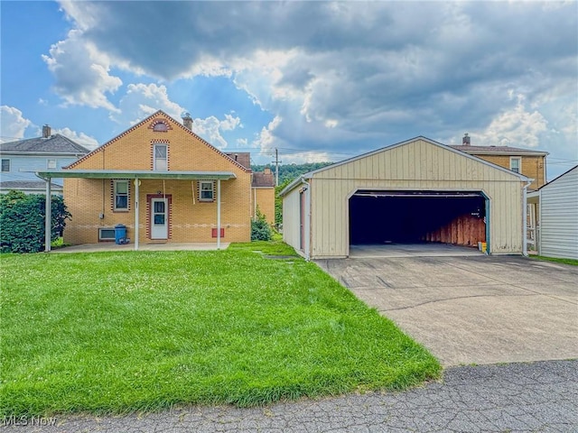 1120 N 5th St, Toronto, OH 43964 - view of front of home with a garage, a front lawn, an outdoor structure, brick siding, and a porch