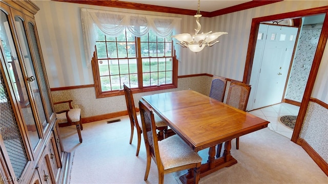 3383 Suffolk Downs, Stow, OH 44224 - dining room with wallpapered walls, a chandelier, and light colored carpet