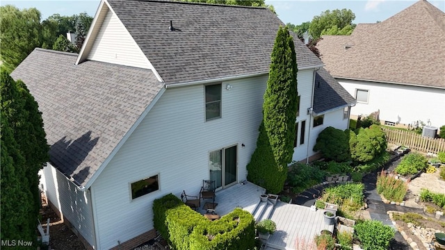 3383 Suffolk Downs, Stow, OH 44224 - back of property with a shingled roof and a wooden deck