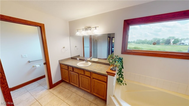 3383 Suffolk Downs, Stow, OH 44224 - bathroom with vanity and a garden tub
