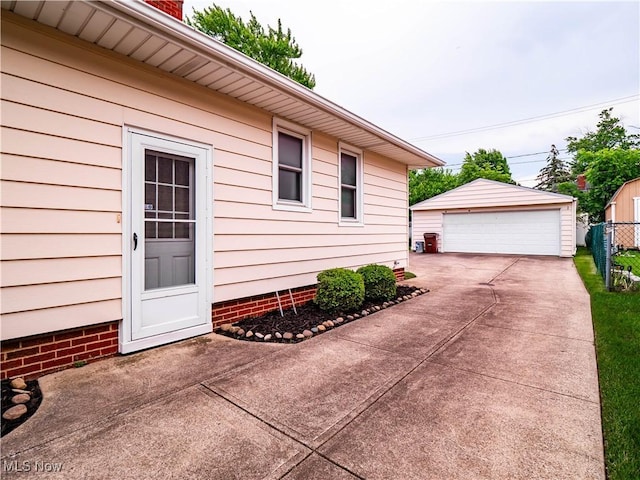 3323 N Ave, Parma, OH 44134 - view of side of home with a detached garage and an outdoor structure