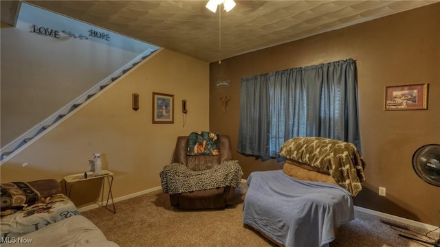 217 Mclaughlin Ave, Byesville, OH 43723 - living area with carpet flooring and stairs