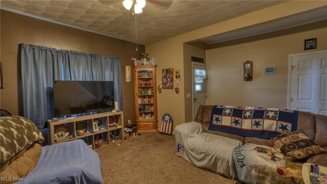 217 Mclaughlin Ave, Byesville, OH 43723 - living room featuring carpet floors and a ceiling fan