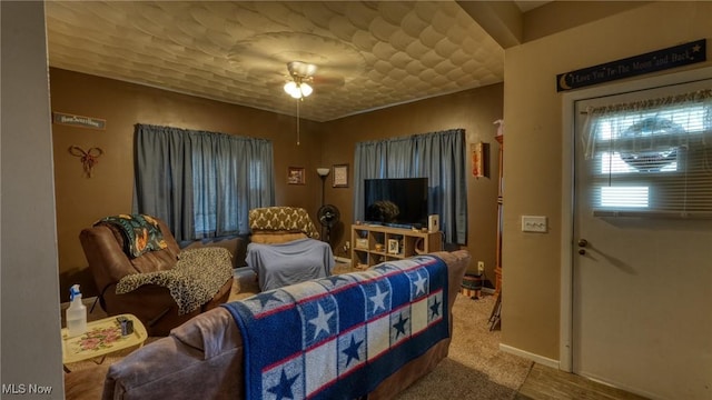 217 Mclaughlin Ave, Byesville, OH 43723 - living room with baseboards and ceiling fan