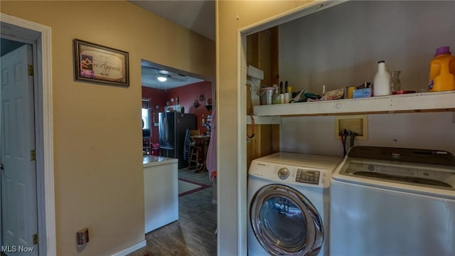 217 Mclaughlin Ave, Byesville, OH 43723 - laundry area with washer and dryer and dark wood-style flooring