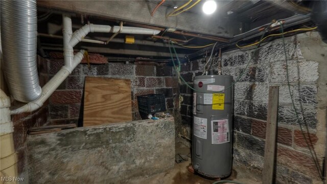 217 Mclaughlin Ave, Byesville, OH 43723 - utility room featuring electric water heater