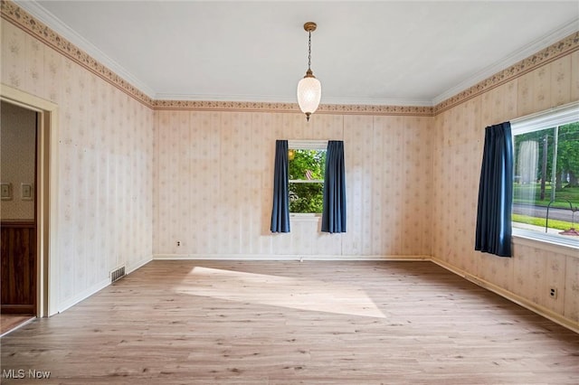 158 Elm St, Leetonia, OH 44431 - empty room featuring wood finished floors and crown molding