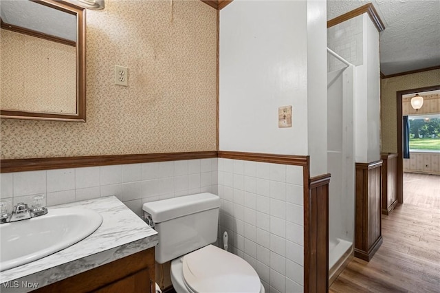 158 Elm St, Leetonia, OH 44431 - bathroom featuring wood finished floors, wainscoting, wallpapered walls, ornamental molding, and vanity