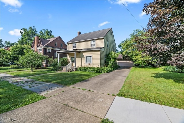 158 Elm St, Leetonia, OH 44431 - view of front facade with a front yard, covered porch, and a chimney