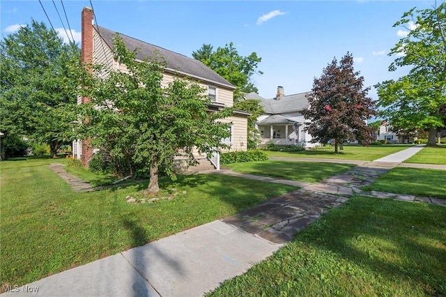 158 Elm St, Leetonia, OH 44431 - view of front of house with a front lawn