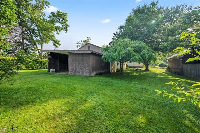 158 Elm St, Leetonia, OH 44431 - view of green lawn with an outbuilding