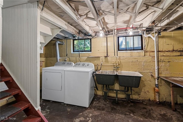 158 Elm St, Leetonia, OH 44431 - below grade area featuring washer and clothes dryer and concrete block wall
