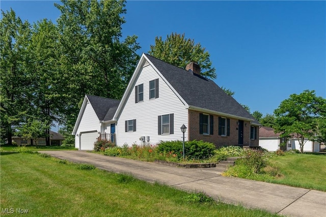 233 Robbies Run, Cortland, OH 44410 - view of front of house featuring a chimney, a front lawn, a garage, brick siding, and roof with shingles