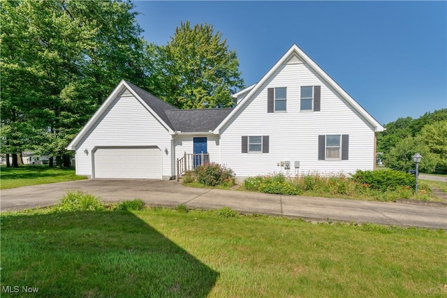 233 Robbies Run, Cortland, OH 44410 - traditional home with driveway, a front lawn, an attached garage, and a shingled roof