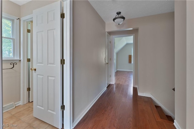 233 Robbies Run, Cortland, OH 44410 - hallway with baseboards and light wood finished floors