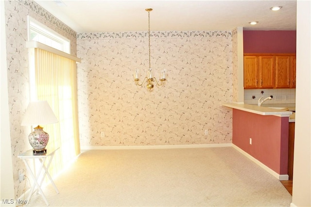 9 Hunters Woods Blvd Unit B, Canfield, OH 44406 - unfurnished dining area with a chandelier, carpet, and wallpapered walls
