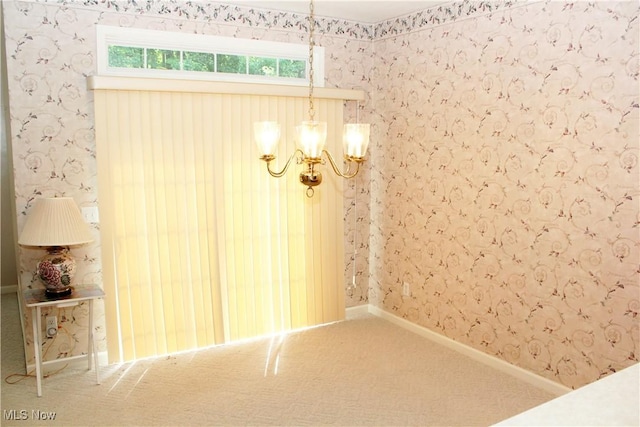 9 Hunters Woods Blvd Unit B, Canfield, OH 44406 - unfurnished dining area with a chandelier, wallpapered walls, and carpet floors