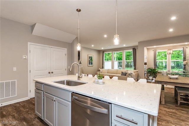 864 Woodside Dr, Westlake, OH 44145 - kitchen featuring stainless steel dishwasher, a center island with sink, open floor plan, recessed lighting, and light stone counters