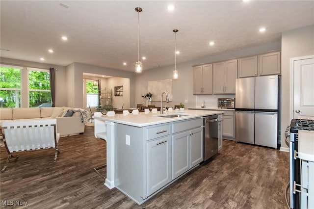 864 Woodside Dr, Westlake, OH 44145 - kitchen featuring stainless steel appliances, gray cabinets, dark wood finished floors, and recessed lighting