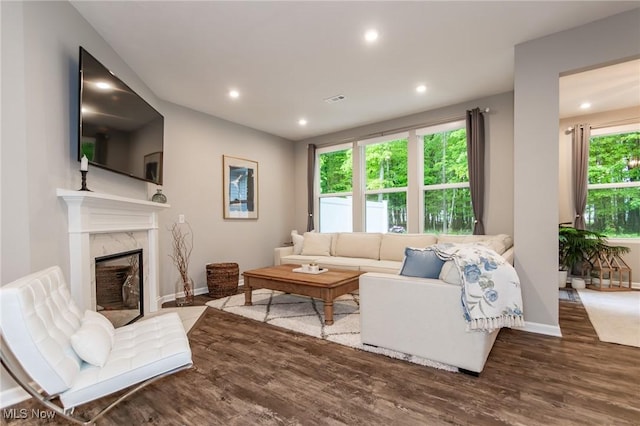 864 Woodside Dr, Westlake, OH 44145 - living room featuring wood finished floors, a high end fireplace, and recessed lighting