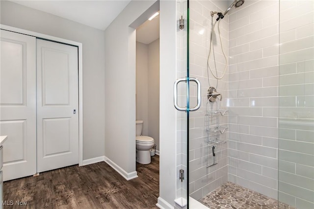 864 Woodside Dr, Westlake, OH 44145 - bathroom featuring a stall shower and wood finished floors