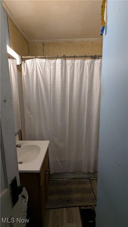 1549 Quimby Ave SW, Canton, OH 44706 - bathroom with vanity, wood finished floors, and a shower with shower curtain