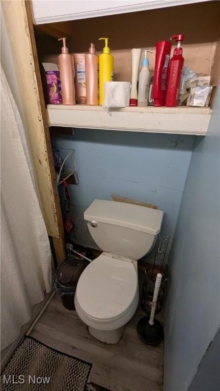 1549 Quimby Ave SW, Canton, OH 44706 - bathroom with toilet and wood finished floors