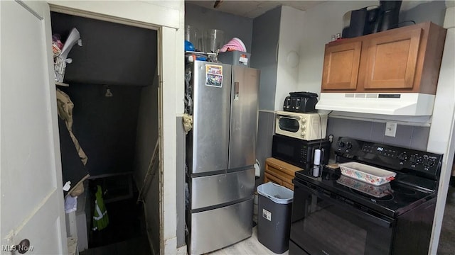 1549 Quimby Ave SW, Canton, OH 44706 - kitchen featuring black appliances, under cabinet range hood, and brown cabinetry