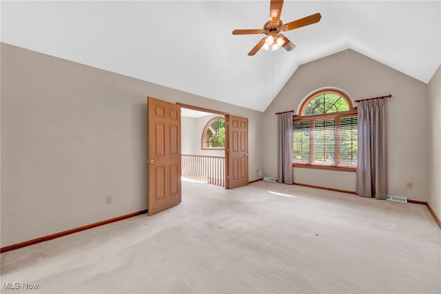 5502 Quail Run, North Olmsted, OH 44070 - empty room featuring ceiling fan, lofted ceiling, and light colored carpet