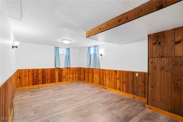 302 Bender Ave, Akron, OH 44312 - unfurnished room featuring wooden walls, wood finished floors, and a wainscoted wall