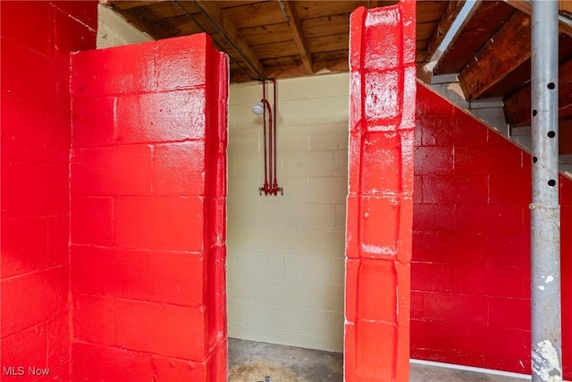 302 Bender Ave, Akron, OH 44312 - interior space with unfinished concrete flooring and concrete block wall