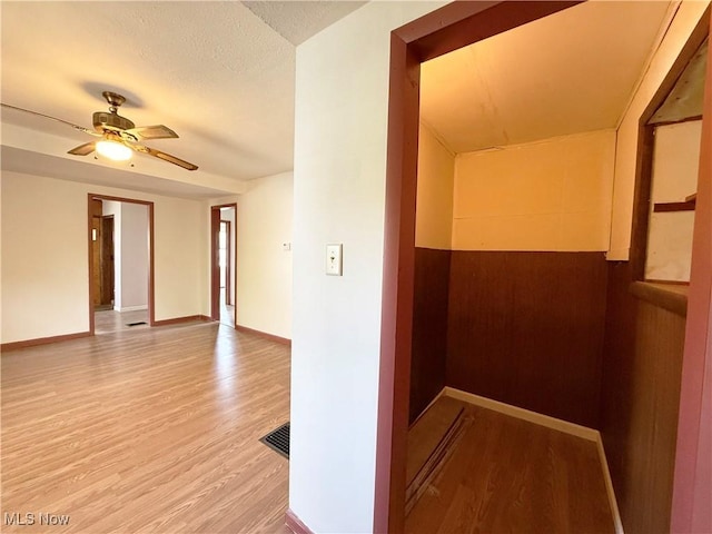 5048 Grove Ave, Lorain, OH 44055 - hallway with light wood finished floors and a textured ceiling