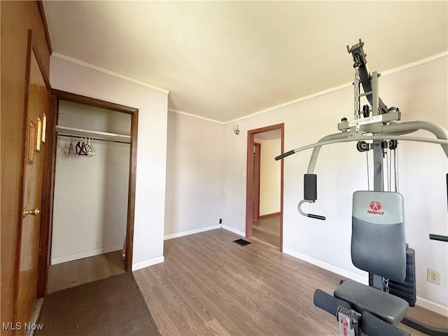 5048 Grove Ave, Lorain, OH 44055 - exercise room with wood finished floors and crown molding